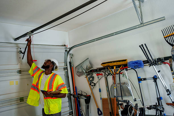 Professional Garage Door Panel Replacement technician working in Village of the Branch, NY